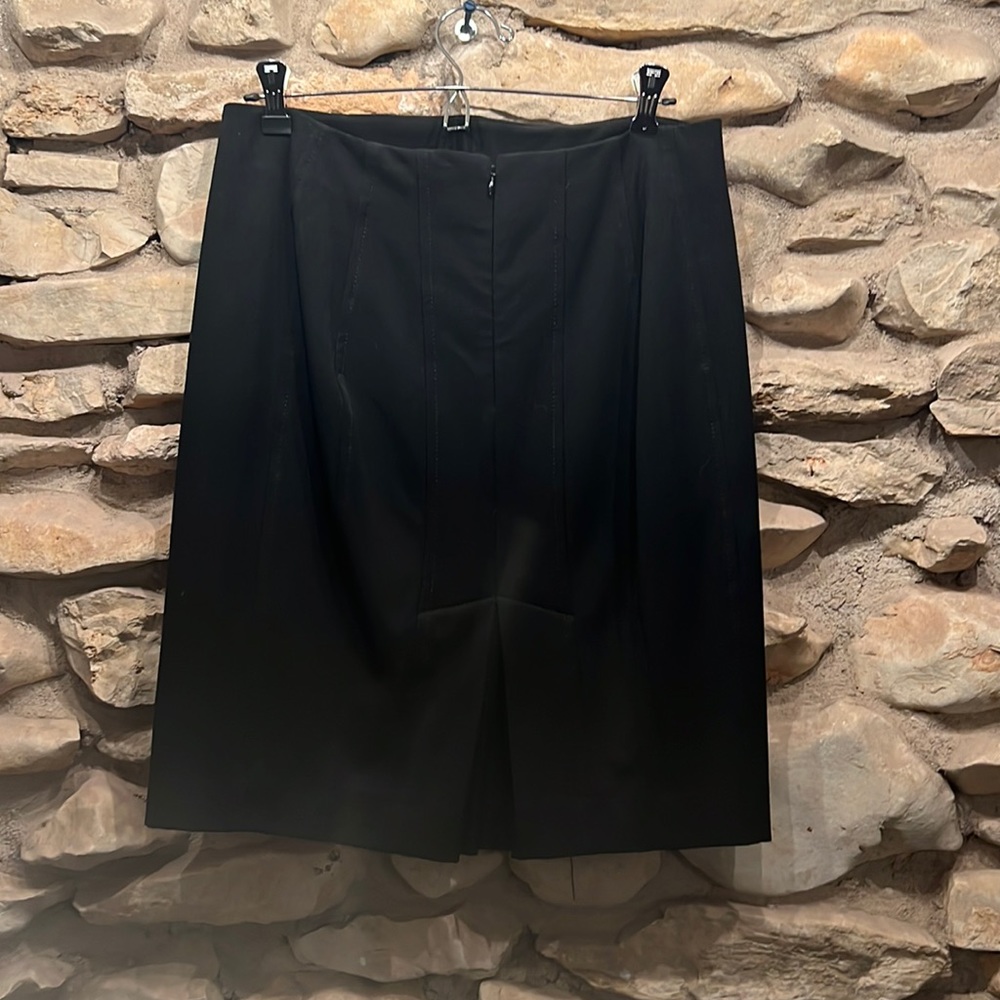 Pencil skirt with cute pleat detailing in the back